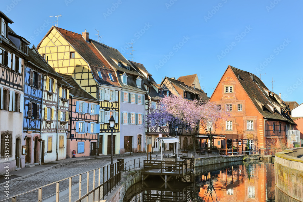 Water canal and colorful half timbered houses in Petite Venise,