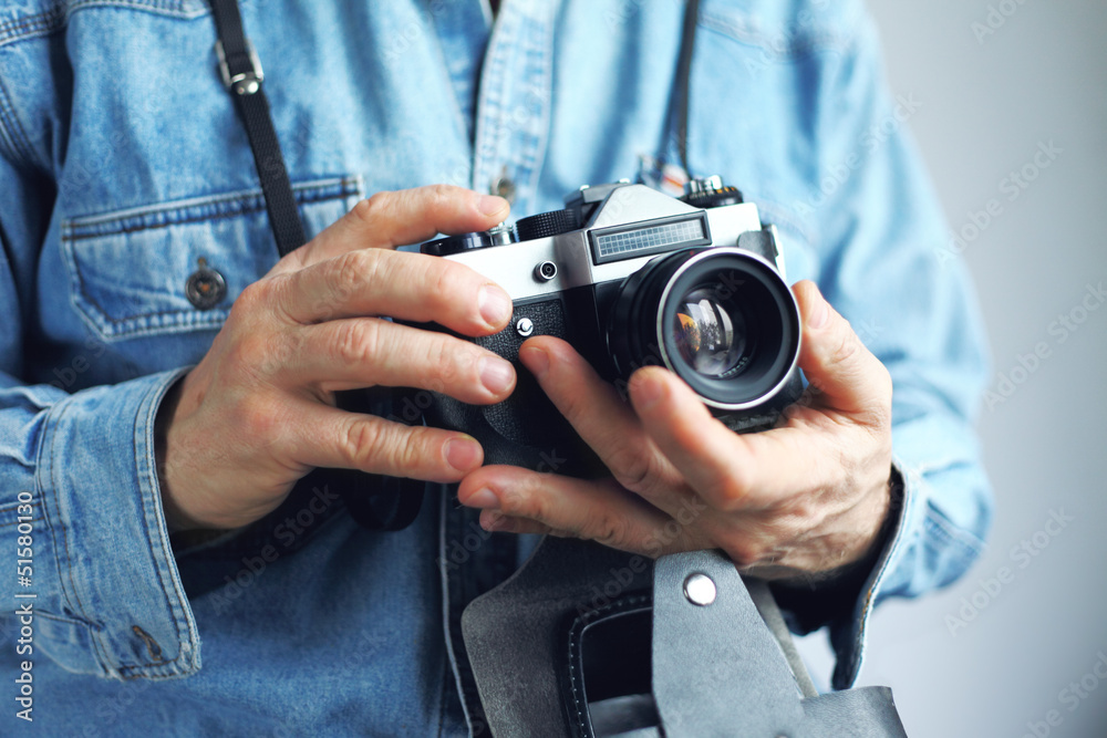 Image of photohrapher with film camera Image of photohrapher with film camera