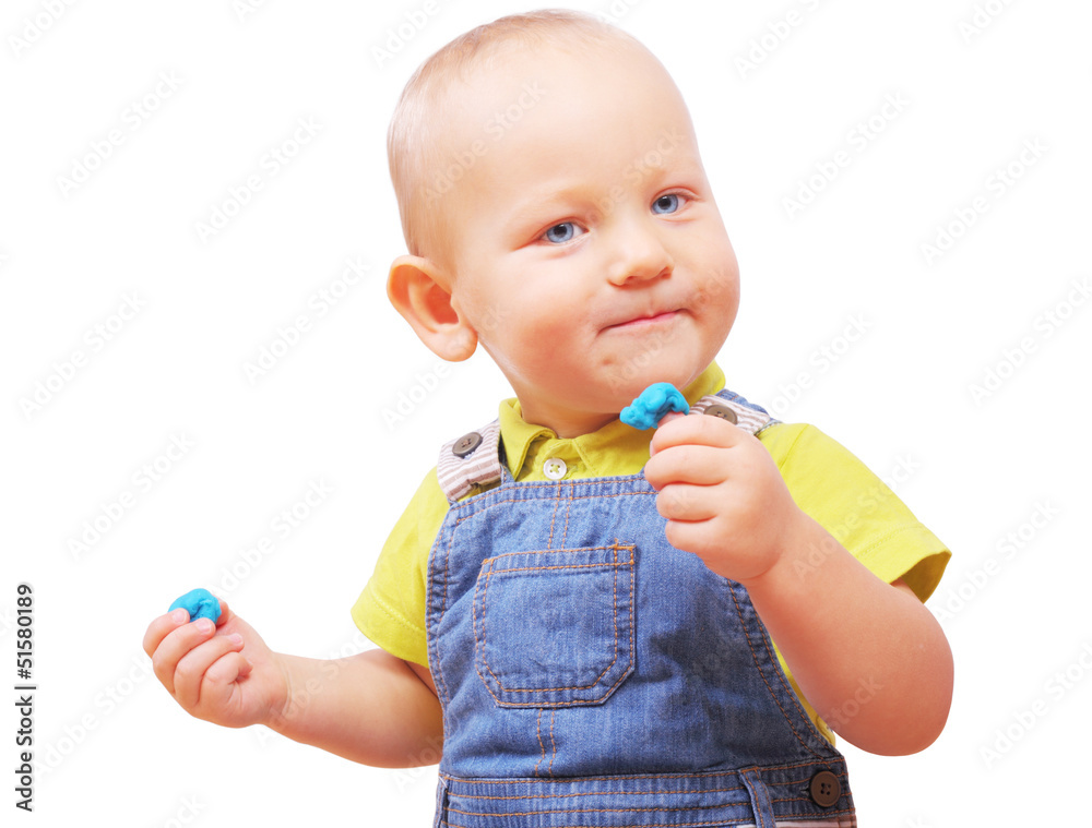 Image of little boy with some stuff in his hands isolated on whi Image of little boy with some stuff in his hands isolated on whi