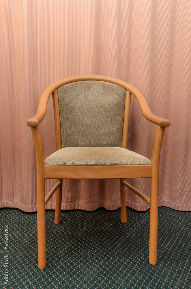 Obraz premium Chair against the curtains
