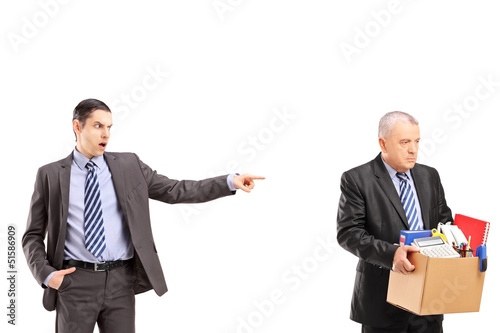 Fotografie Angry boss firing an employee