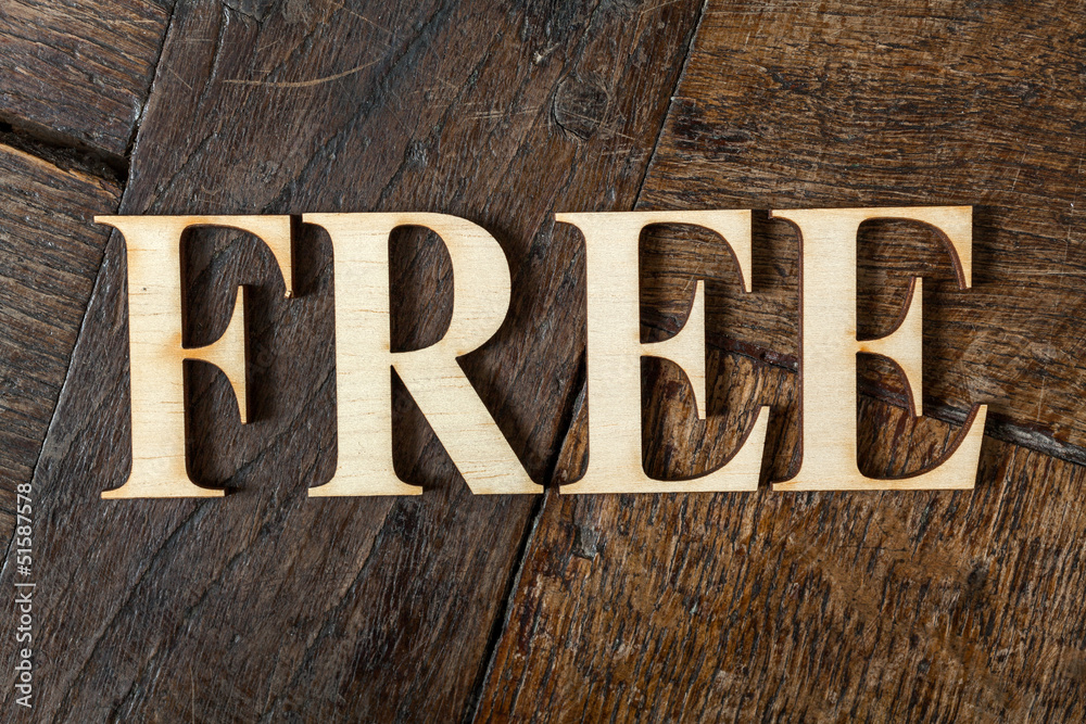 Fototapeta premium Wooden letters on wooden background