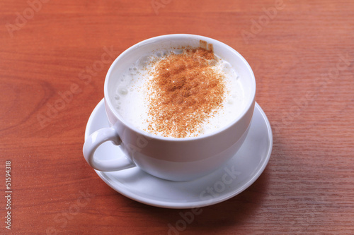 Cup of hot milk with nutmeg