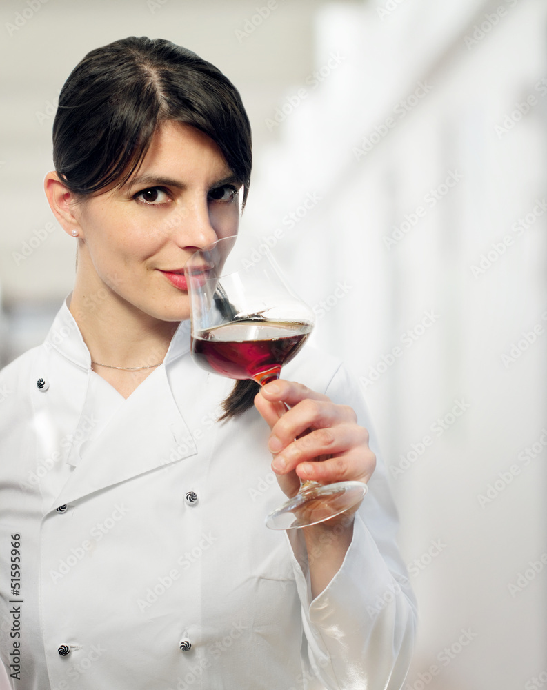 FEMALE CHEF WITH RED WINE GLASS