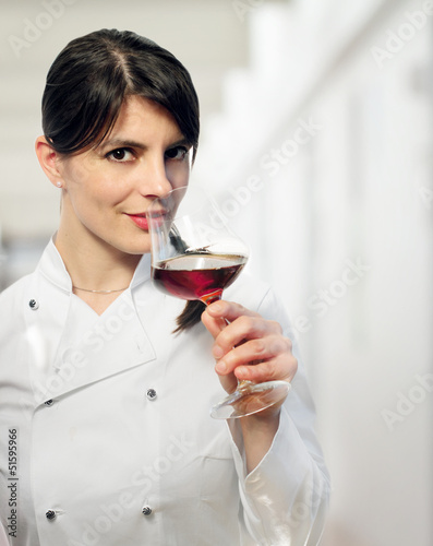 FEMALE CHEF WITH RED WINE GLASS