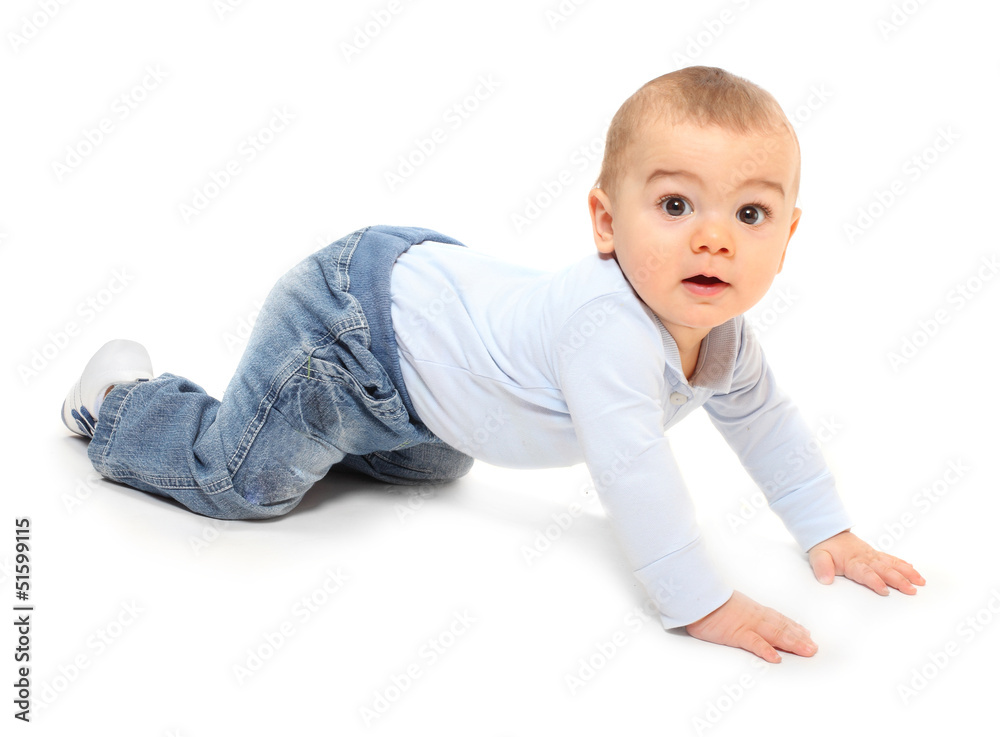 Funny toddler boy playing on a white background. Funny toddler boy playing on a white background.