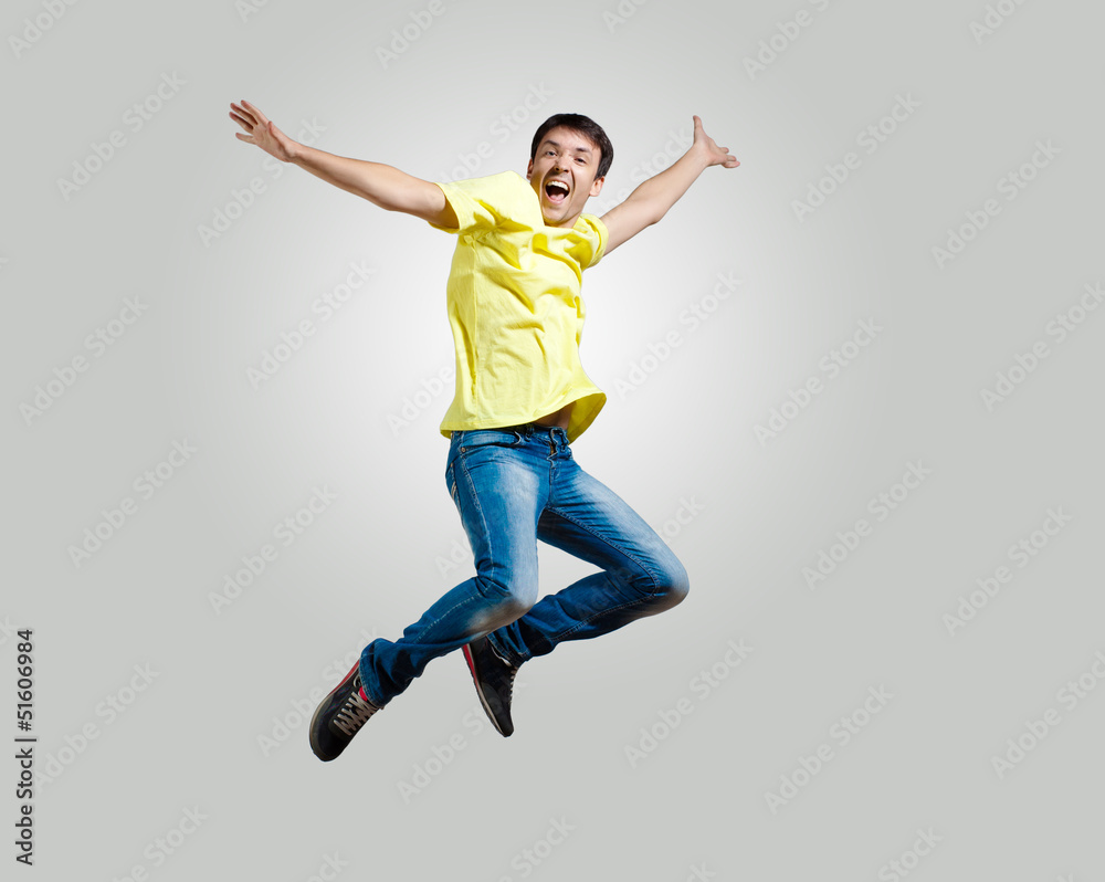 Young man dancing and jumping Young man dancing and jumping