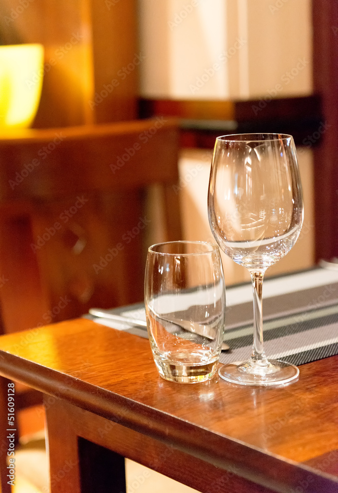 Empty glasses set in restaurant Empty glasses set in restaurant