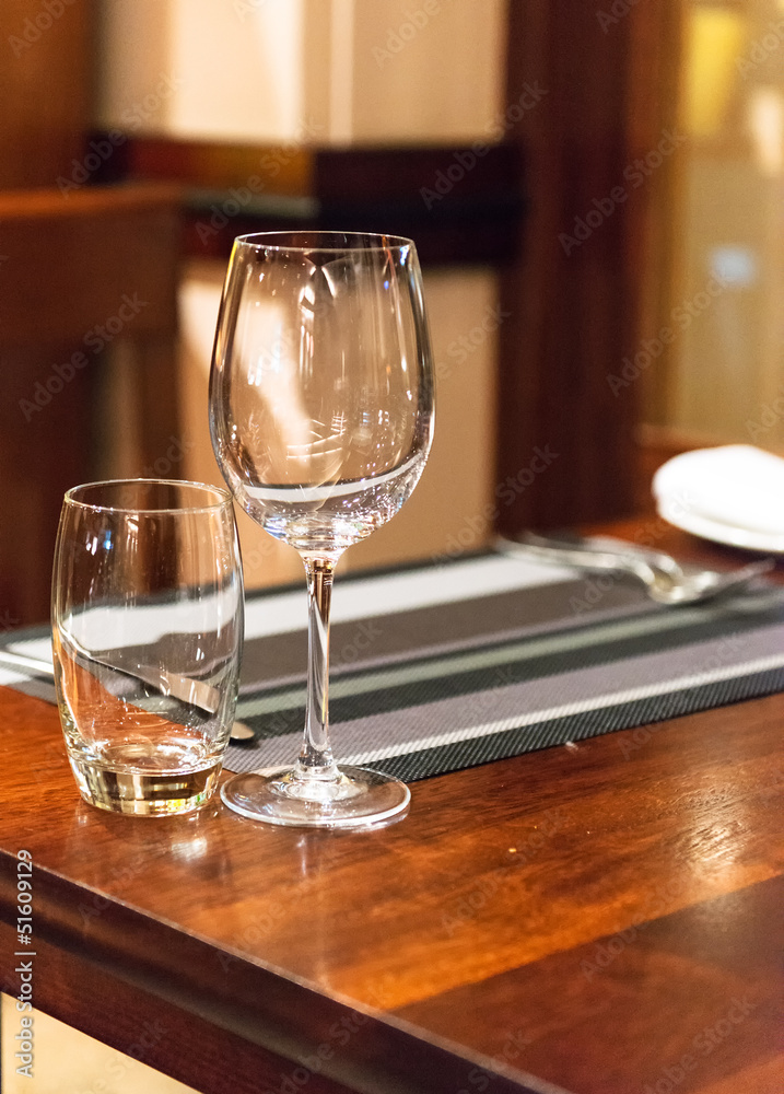 Empty glasses set in restaurant Empty glasses set in restaurant