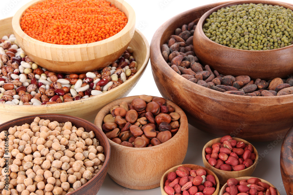 Different kinds of beans in bowls close-up Different kinds of beans in bowls close-up