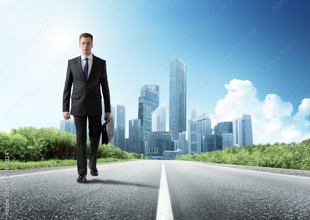 business man walking on the road