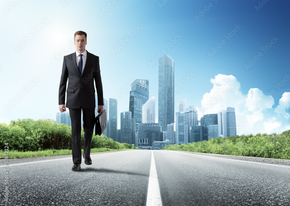 business man walking on the road business man walking on the road