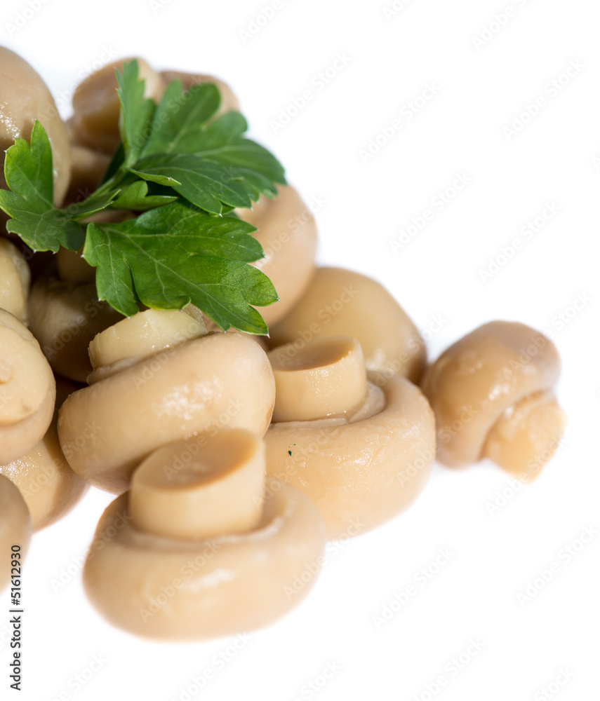 Heap of canned Mushrooms (on white) Heap of canned Mushrooms (on white)