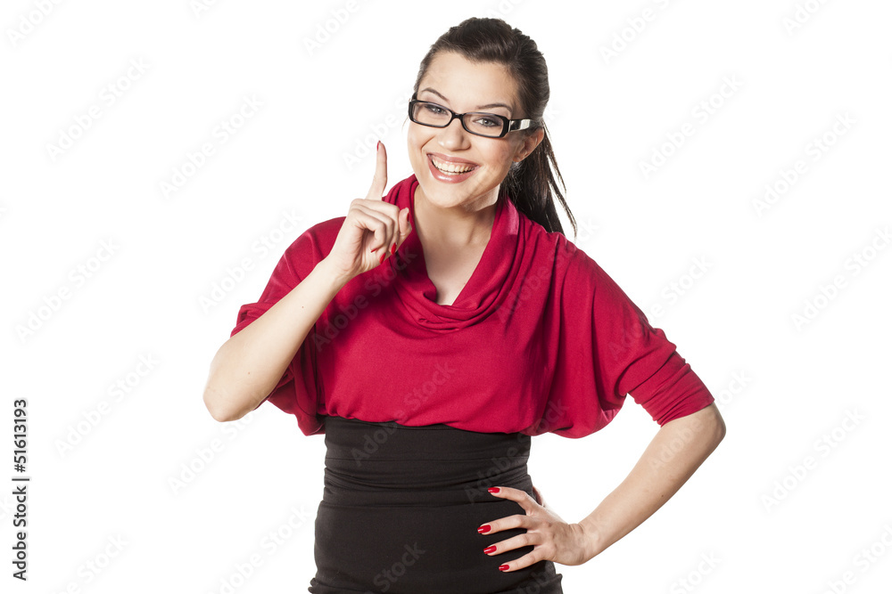 Fototapeta premium Girl shows a finger upwards or advertises a product