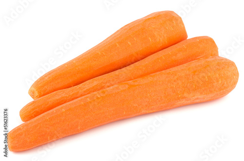 Peeled fresh carrots isolated on white background