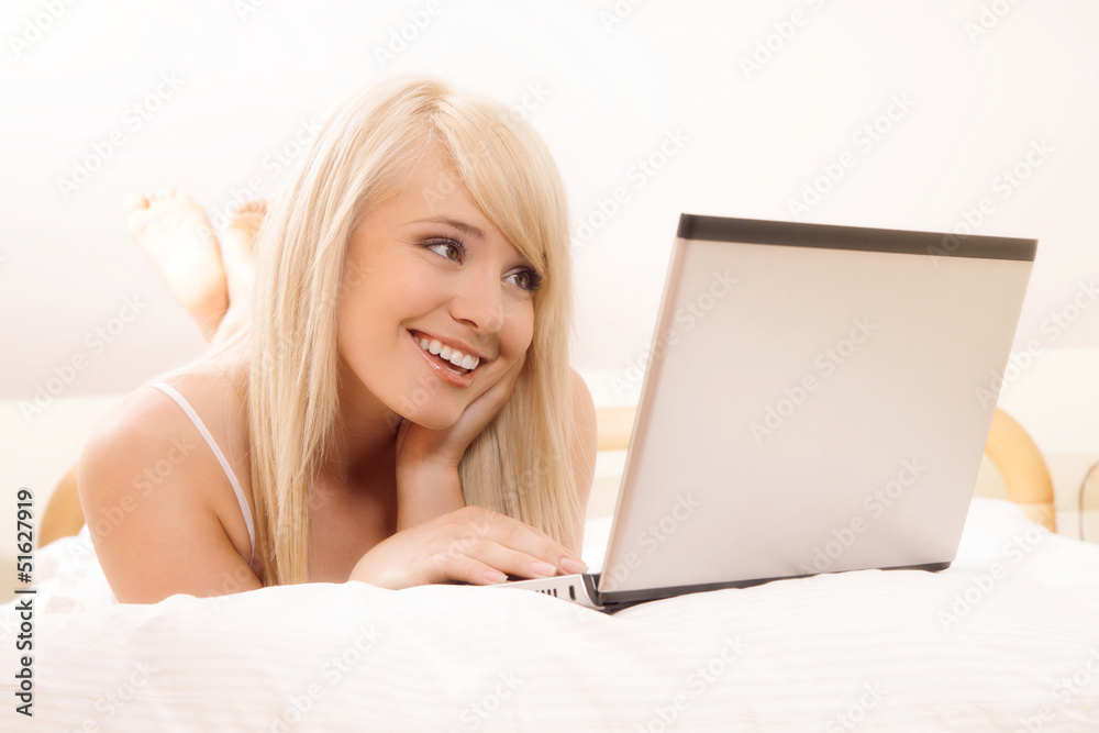 Young woman browsing internet. Selective focus Young woman browsing internet. Selective focus