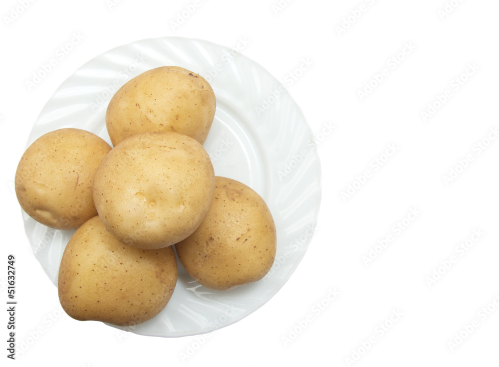 fresh potatoes on the plate on white background fresh potatoes on the plate on white background
