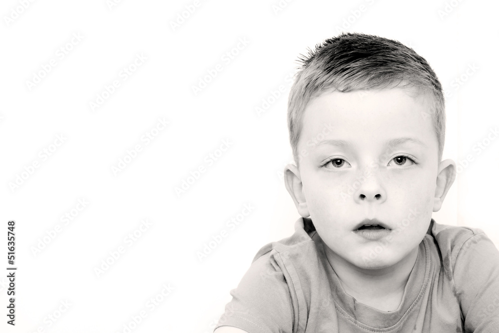 sad little boy with an upset expression sad little boy with an upset expression