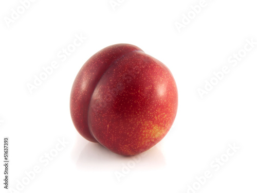 Isolated red ripe plum on a white background