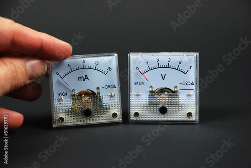 old and analog current and voltage meters
