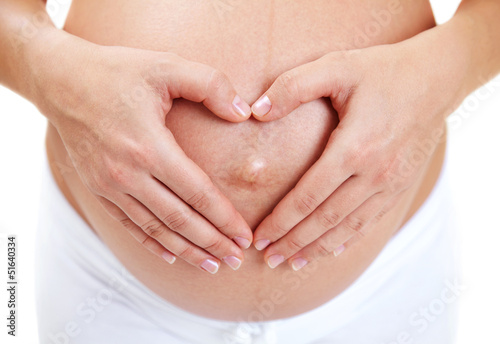Wallpaper Mural pregnant belly with fingers heart symbol Torontodigital.ca