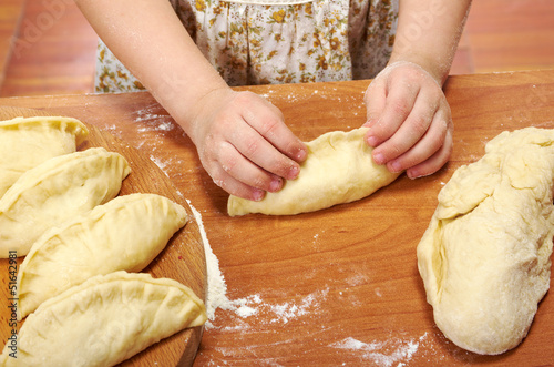  little girl kneading dough