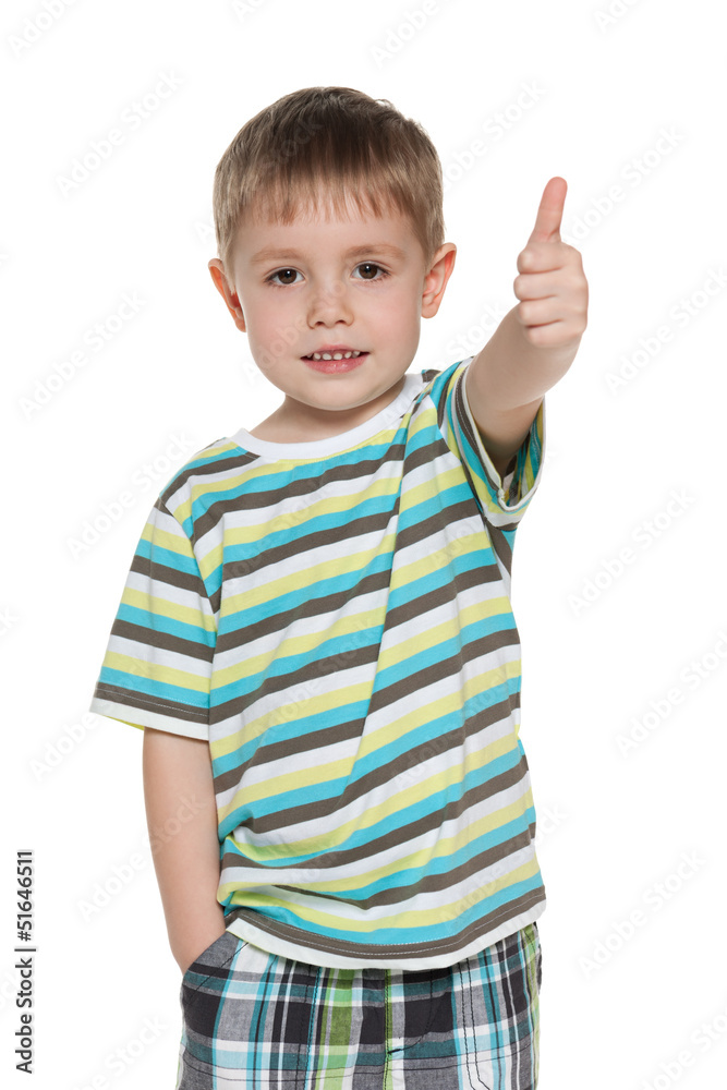 Little boy in striped shirt holds his thumb up Little boy in striped shirt holds his thumb up