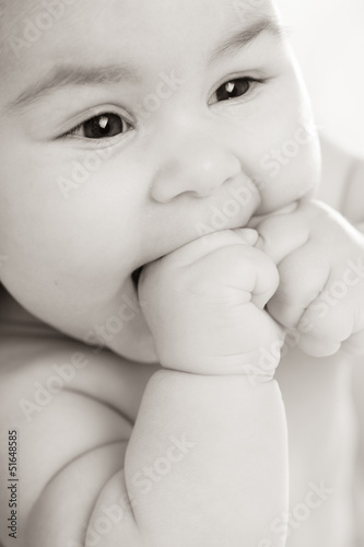 baby in pink dress photo