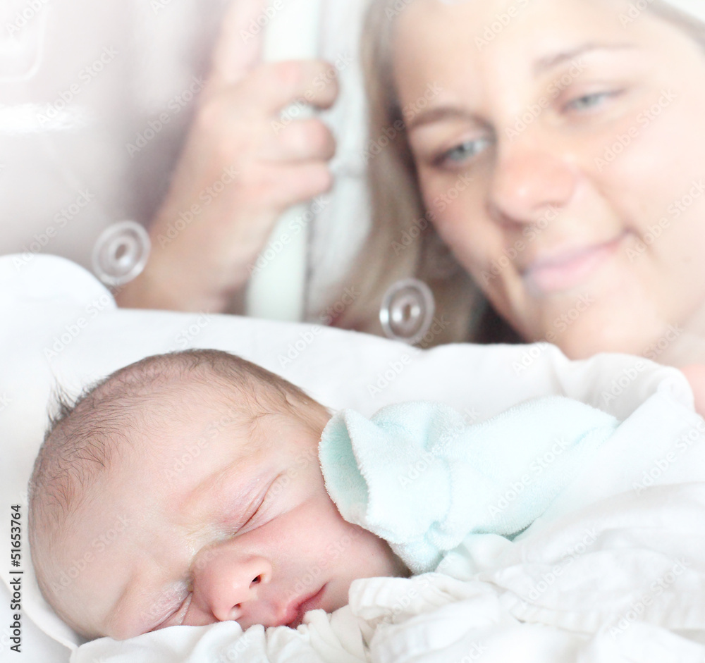 Newborn baby boy sleeping in a incubator. Newborn baby boy sleeping in a incubator.