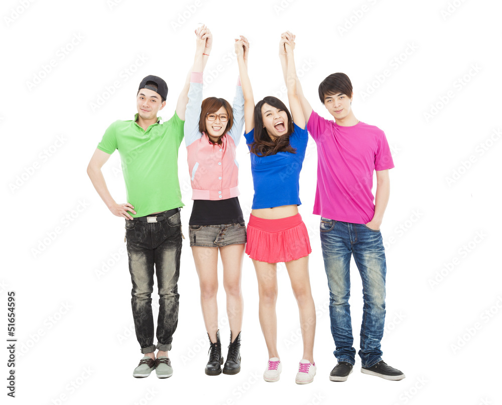 Fototapeta premium happy young group standing together with hands up