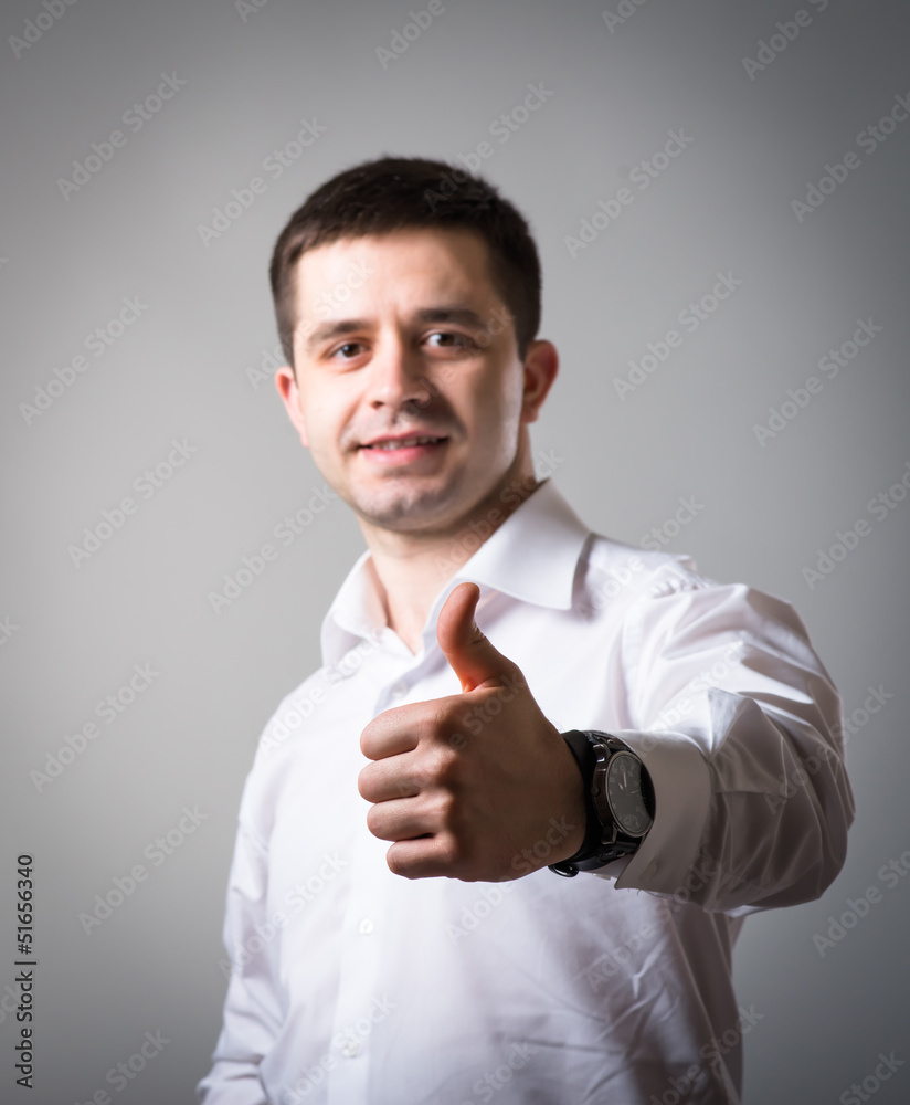 man holding his thumb up man holding his thumb up