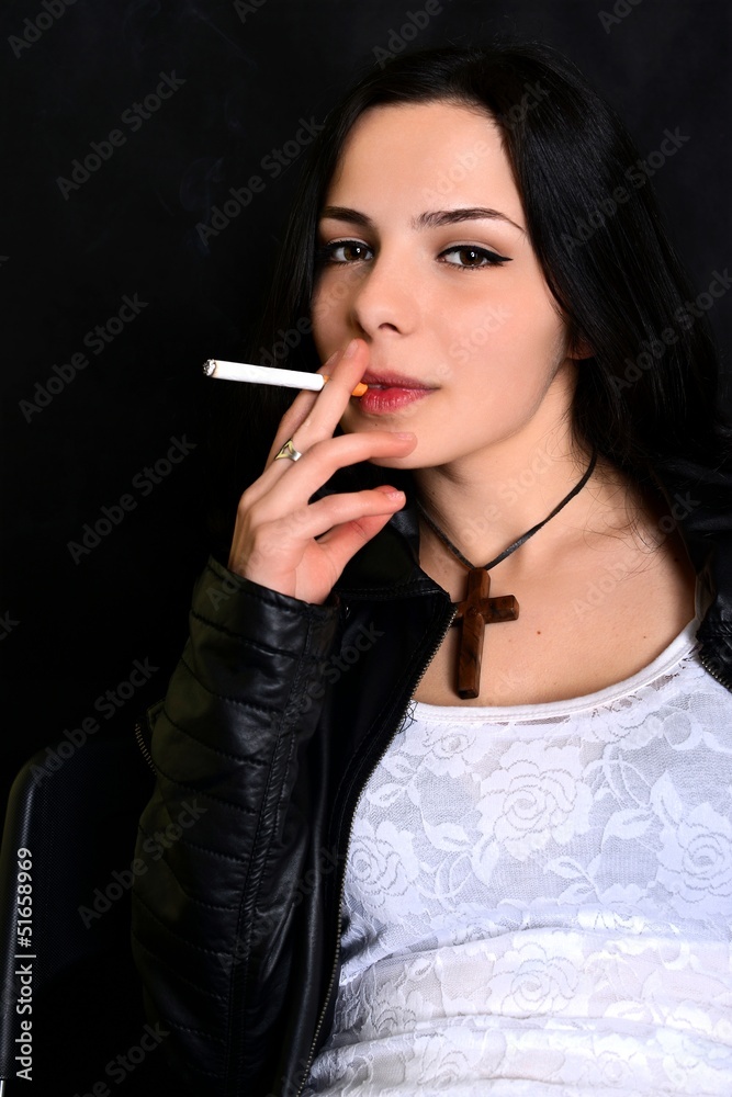 Fototapeta premium Smoking woman with a cigarette