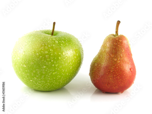 Ripe red pear with green apple on white background