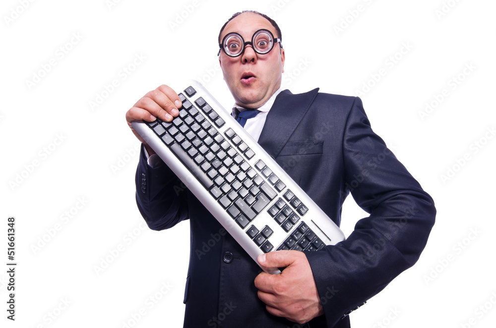 Nerd businessman with computer keyboard on white Nerd businessman with computer keyboard on white