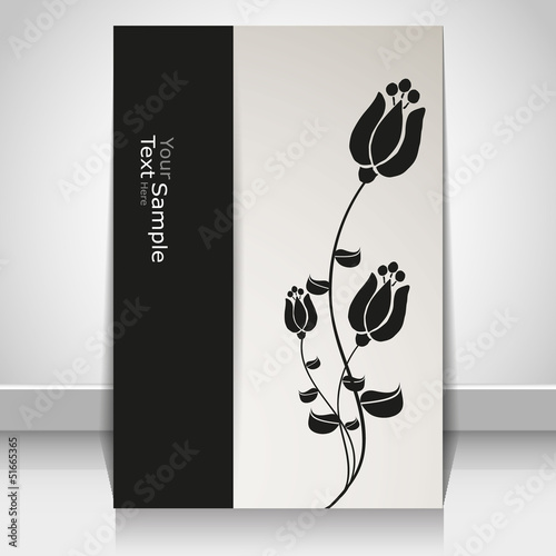 magazine cover with black and white flowers