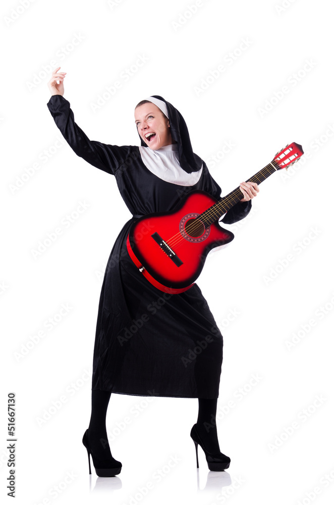Fototapeta premium Nun playing guitar isolated on white