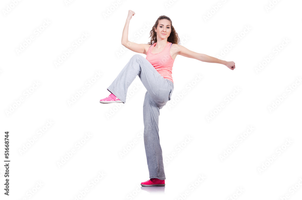 Young female doing exercises on white Young female doing exercises on white