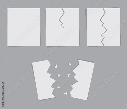 Paper in various states of being ripped in half