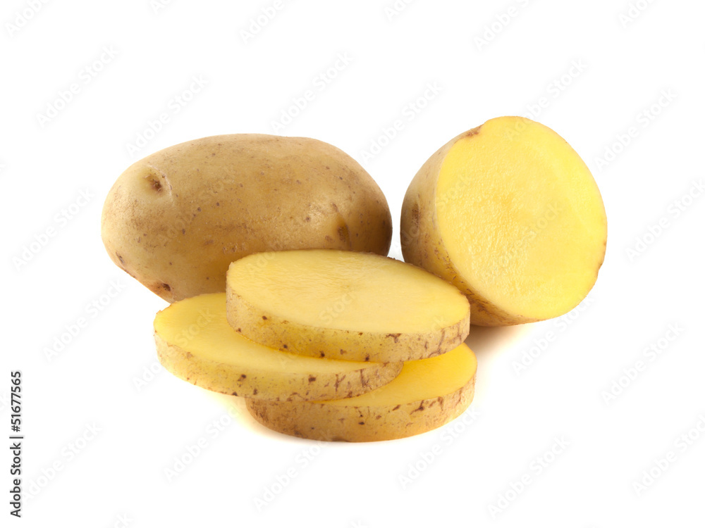 New potato with sliced half and slices isolated New potato with sliced half and slices isolated