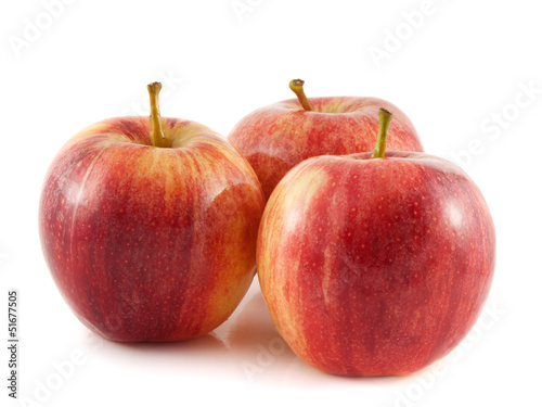 Isolated three red apple on a white background