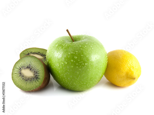 Isolated wet green apple with kiwi and lemon