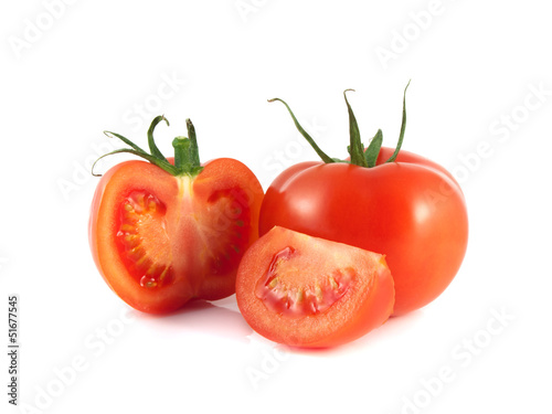 Isolated red tomato with sliced half on a white