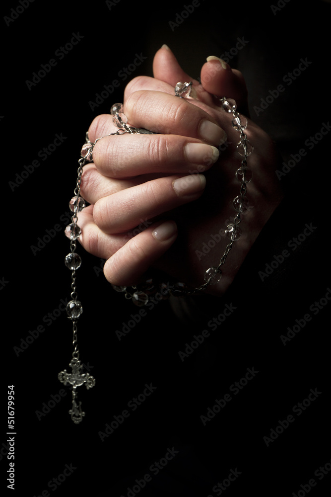 Folded Hands holding a Cross Folded Hands holding a Cross