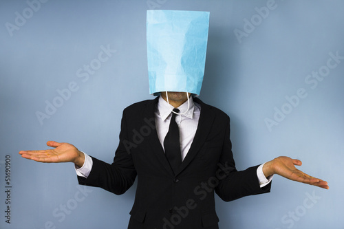 Фотография Businessman with bag over his head