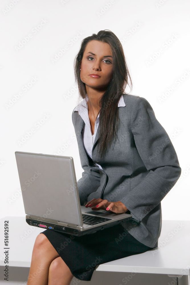 Beautiful young woman working with laptop Beautiful young woman working with laptop