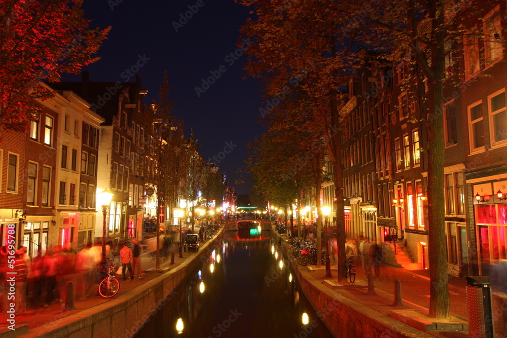Naklejka premium Red light district in Amsterdam The Netherlands at night