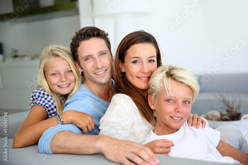 Portrait of family relaxing in sofa