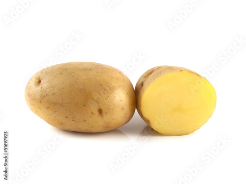 New potato with sliced half isolated on white
