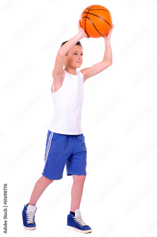 child playing basketball