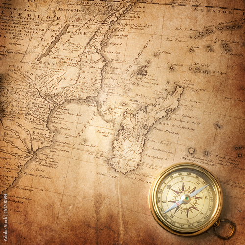 old compass on vintage map 1737